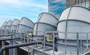 Industrial cooling towers can be a breeding ground for bacteria. (Photo via Healthcare Facilities’ Facebook feed.)  Industrial cooling towers can be a breeding ground for bacteria. (Photo via Healthcare Facilities’ Facebook feed.)